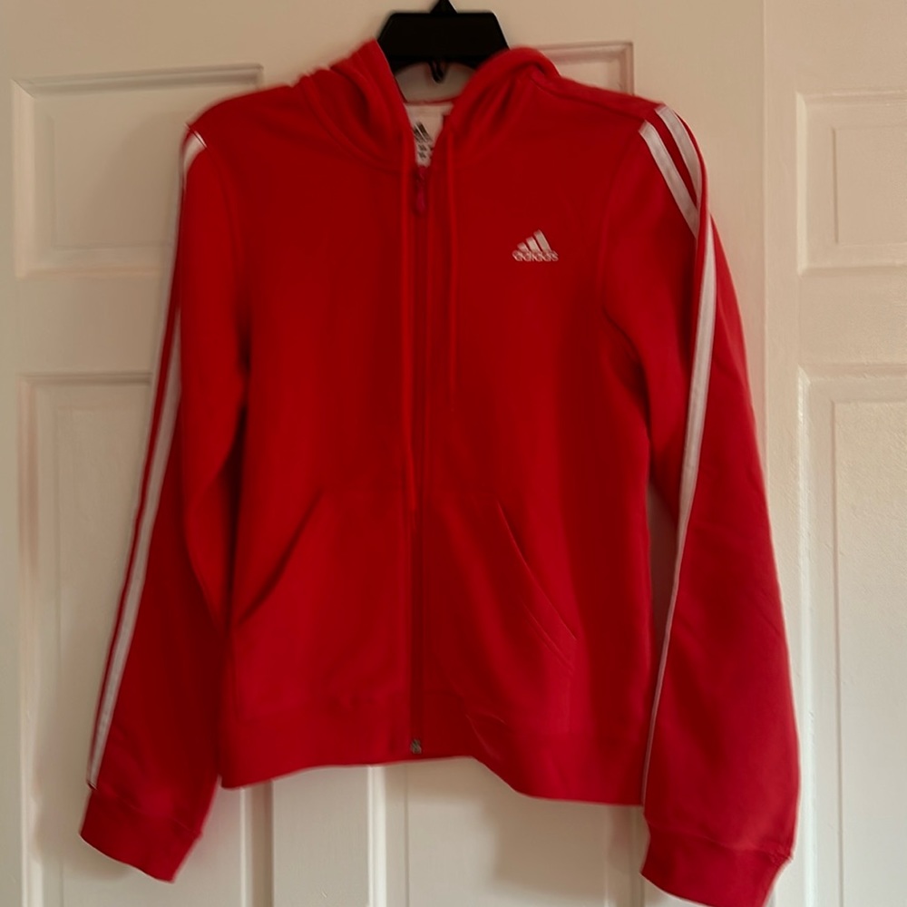 Adidas sweatshirt in size small and peach color.  Almost as new.